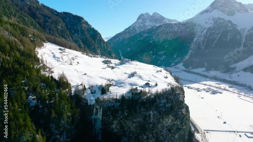 Aerial view of the small village of Burgstein in Oetztal, Austria. On a sunny winter day. photo