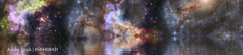 beautiful starry sky and smooth water surface. Elements of this image furnished by NASA.
