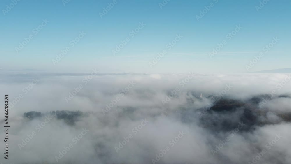 clouds in the early morning, hilly terrain, shot by drone, height about 400 meters, early autumn, central Europe clouds in the early morning, hilly terrain, shot by drone, height about 400 meters, early autumn, central Europe