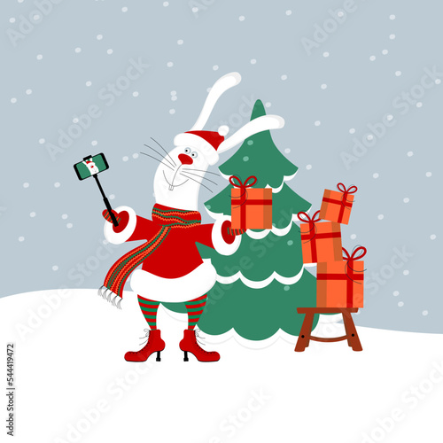 Cute happy smiling white rabbit or hare wearing Santa claus clothes holding gift box taking selfie with smartphone on snowing christmas background with tree. Editable flat style vector illustration