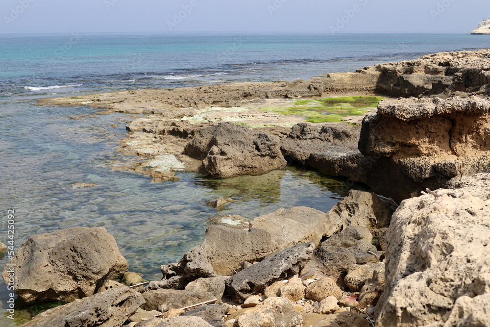 Rocks on the shores of the Mediterranean Sea in northern Israel.