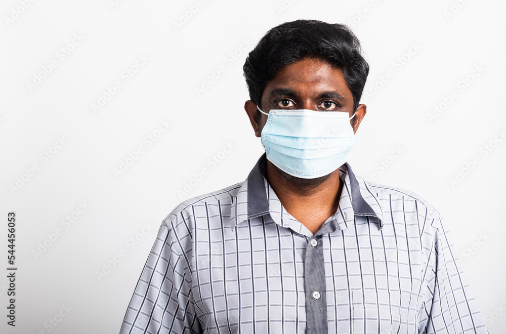 Asian happy portrait young black man wearing face mask protective from virus coronavirus epidemic or air pollution looking camera, studio shot isolated on white background, stop COVID-19 concept Asian happy portrait young black man wearing face mask protective from virus coronavirus epidemic or air pollution looking camera, studio shot isolated on white background, stop COVID-19 concept