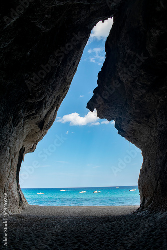 Fototapeta Naklejka Na Ścianę i Meble -  View of the sea from a cave in Cala Luna