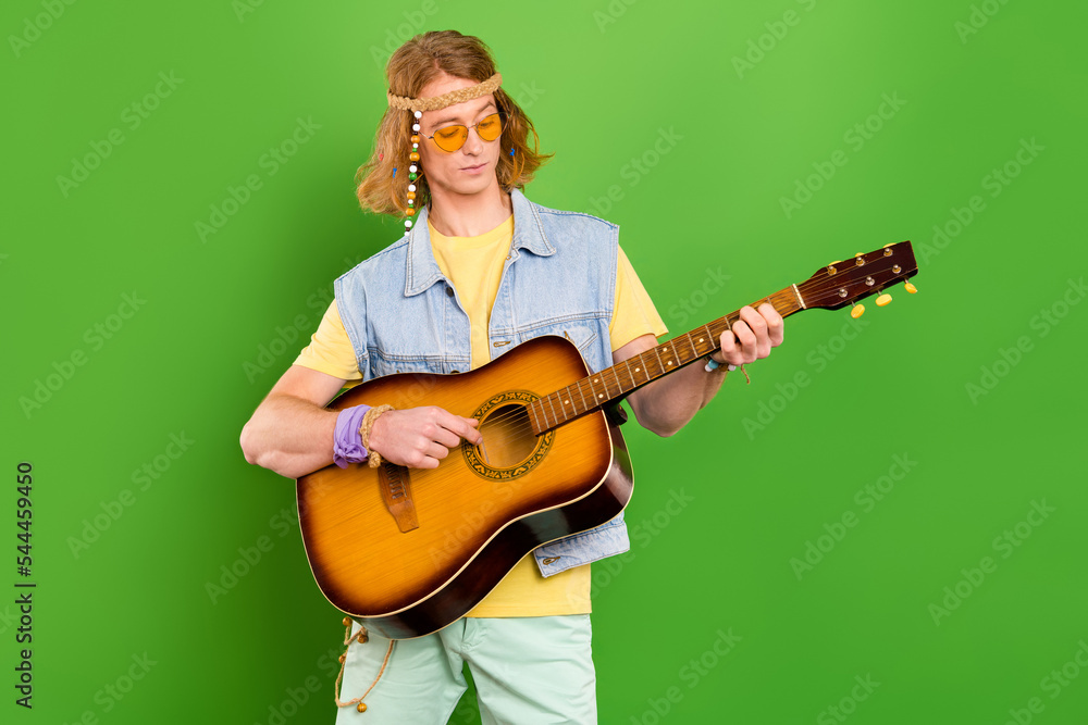 Photo of youth guy travel artist play culture songs melody wear denim stylish clothes isolated vibrant color background