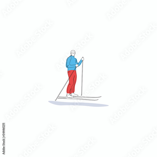 Continuous one line art of skier stands in the snow