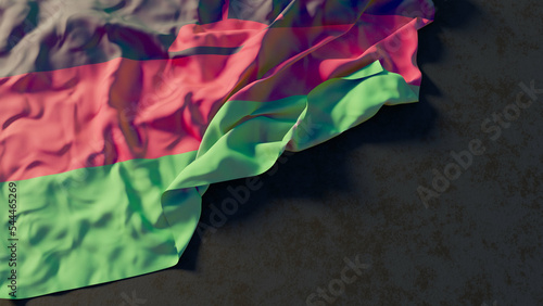 Flag of Malawi with beautiful lighting and colors. Isolated with dark background and copy space.  photo