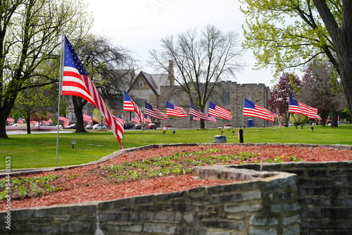 American flags were placed up in the Milwaukee, Wisconsin community to honor veterans memorial day. photo