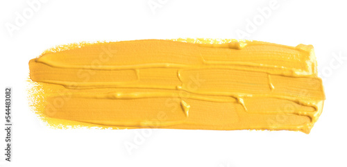 Yellow paint stroke drawn with brush on white background, top view