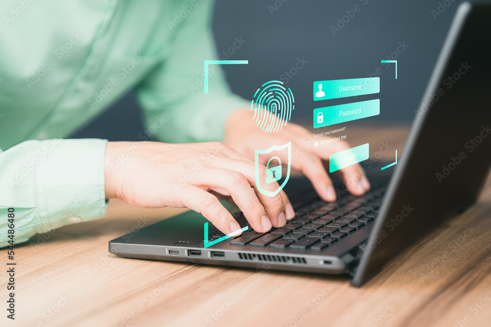 Man typing login user and password, Cyber security concept, Secure encryption and access to the user's private information to access the Internet. Man typing login user and password, Cyber security concept, Secure encryption and access to the user's private information to access the Internet.