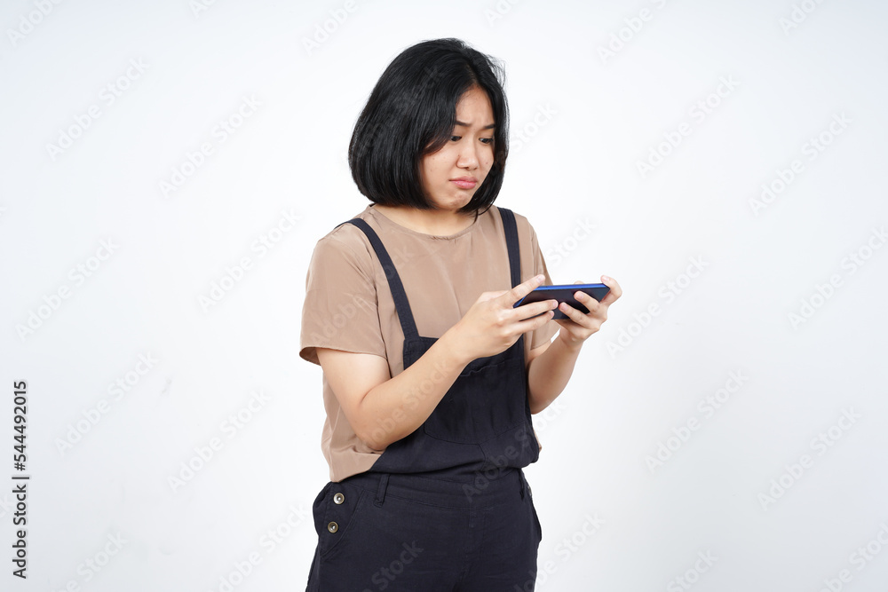 Playing Mobile Game on Smartphone and Angry for lose of Beautiful Asian Woman Isolated On White Playing Mobile Game on Smartphone and Angry for lose of Beautiful Asian Woman Isolated On White