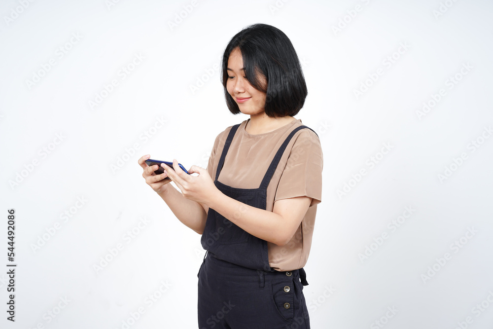 Playing Mobile Game on Smartphone of Beautiful Asian Woman Isolated On White Background Playing Mobile Game on Smartphone of Beautiful Asian Woman Isolated On White Background