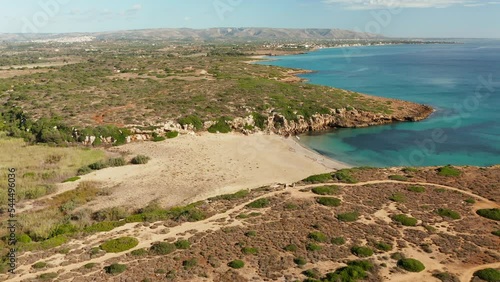 Calamosche Beach, Sandy Little Bay With Calm Blue Water In Summer In Noto, Sicily, Italy. - aerial photo