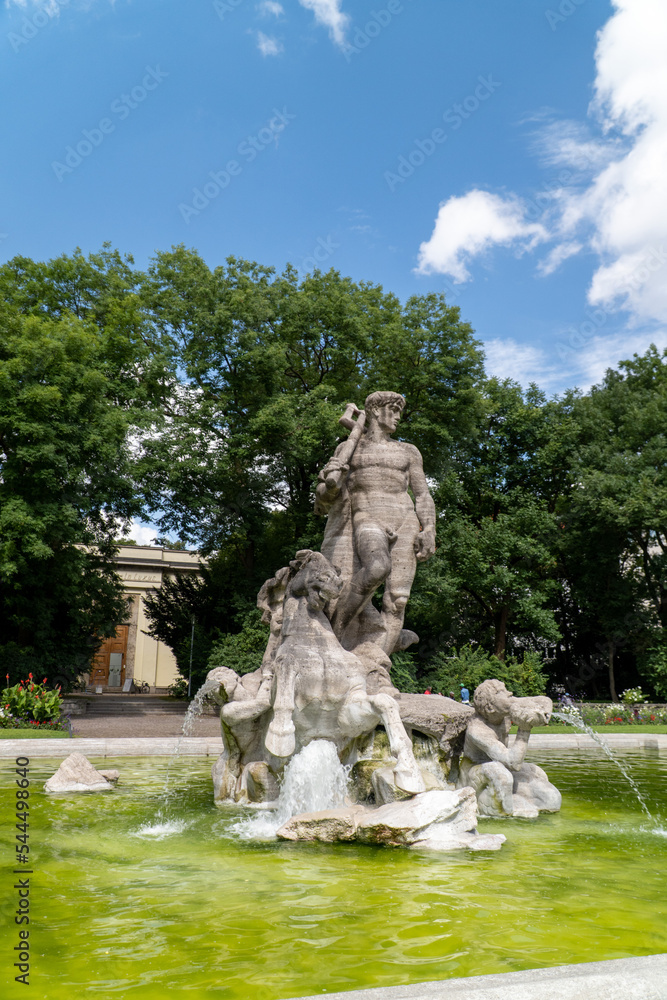 Fototapeta premium Munich fountain in the park statue 