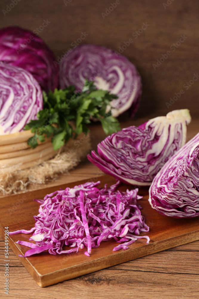 Cut fresh red cabbage on wooden table Cut fresh red cabbage on wooden table