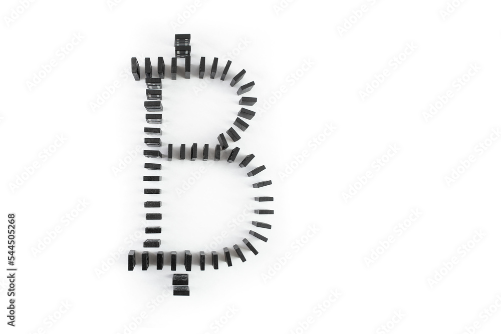 Bitcoin currency symbol made from domino tiles on white Bitcoin currency symbol made from domino tiles on white