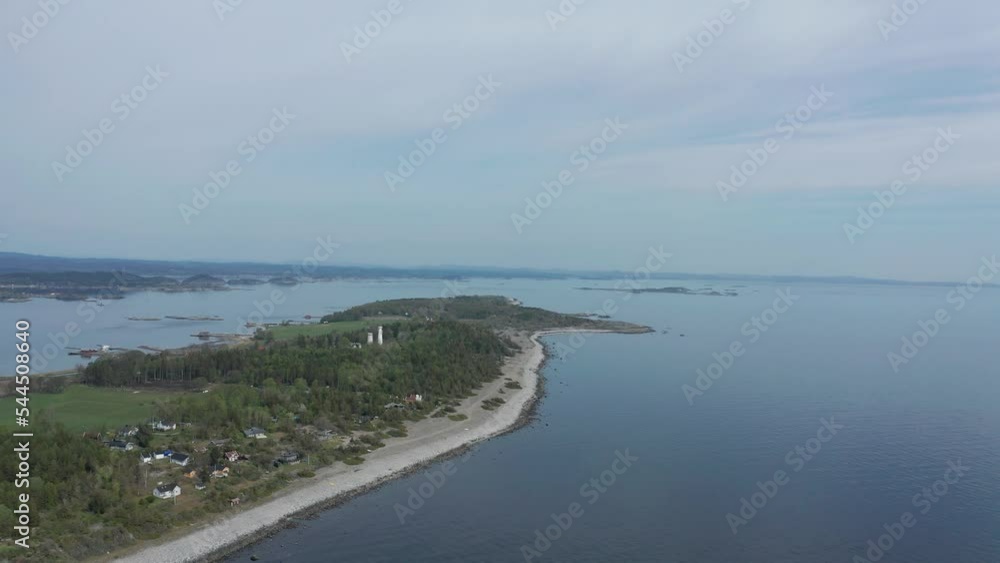 Aerial of the Jomfruland Lighthouse (Norwegian: Jomfruland fyr) It is a coastal lighthouse located on the island of Jomfruland in Kragerø, Norway Aerial of the Jomfruland Lighthouse (Norwegian: Jomfruland fyr) It is a coastal lighthouse located on the island of Jomfruland in Kragerø, Norway
