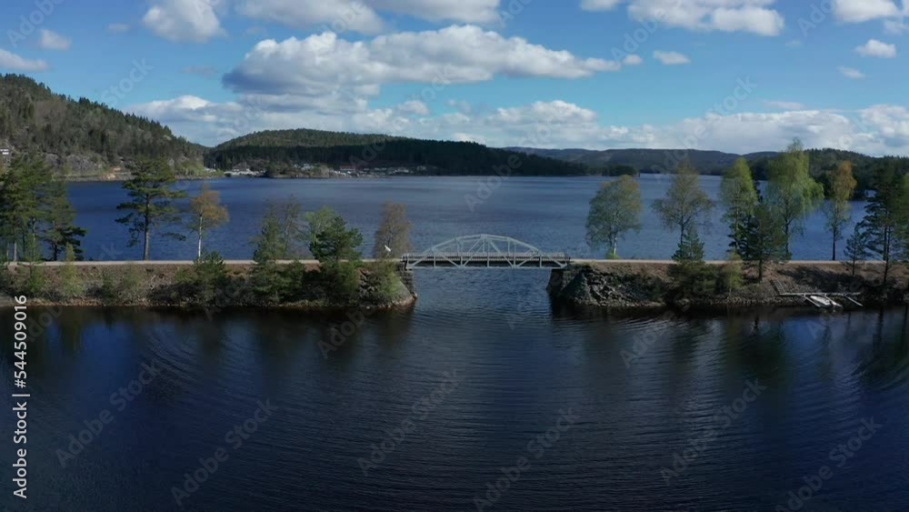 Road cyclist riding in beautiful nature in Norway Road cyclist riding in beautiful nature in Norway