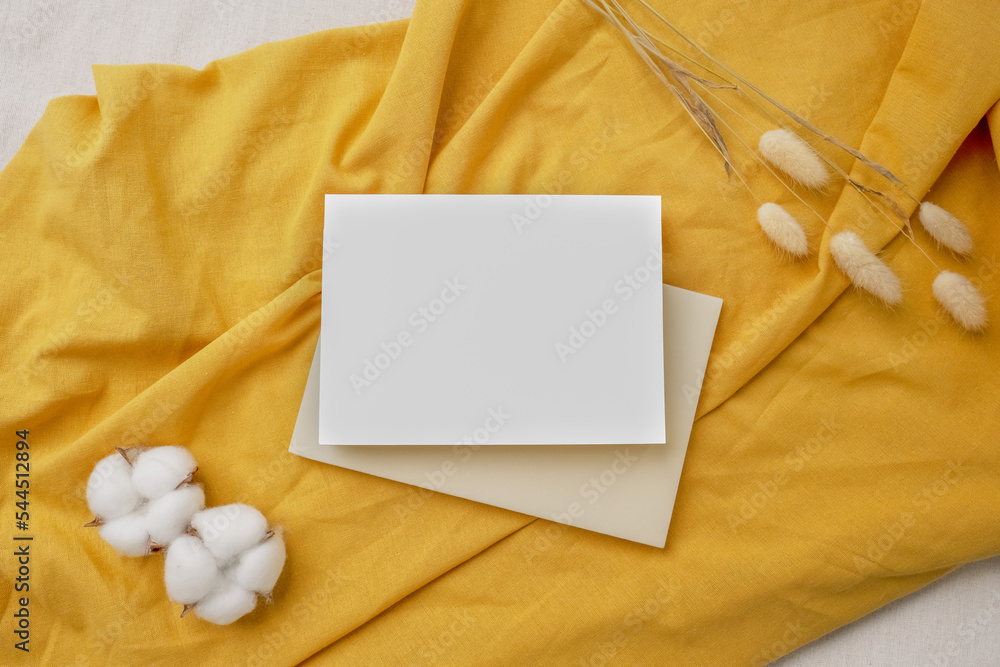 Invitation card mockup on table setting, minimal scandinavian theme Invitation card mockup on table setting, minimal scandinavian theme