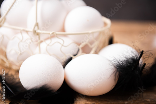 Fresh white eggs in the basket