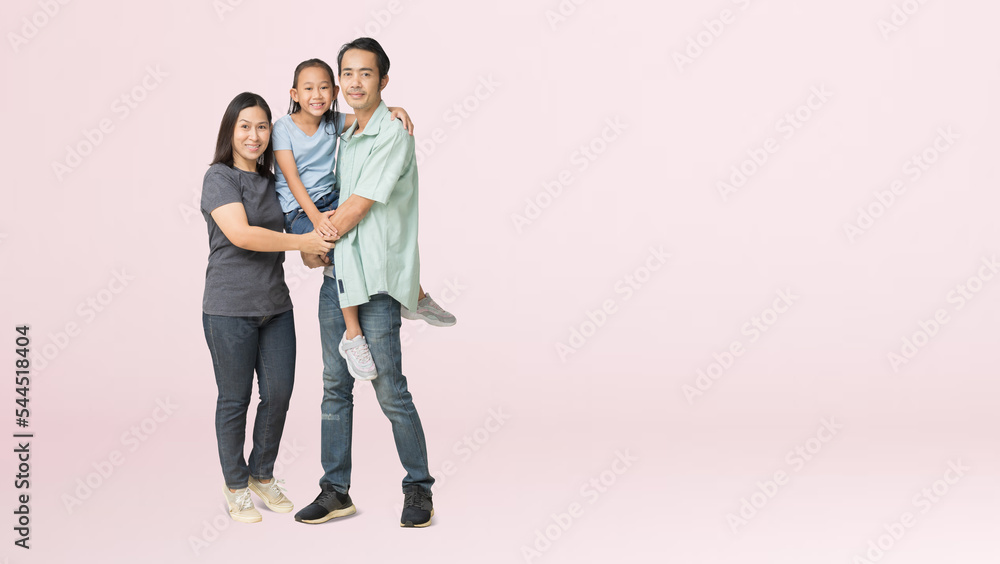 Happy asian family of father, mother and daughter hug, isolated on pink background with Clipping paths for design work empty free space Happy asian family of father, mother and daughter hug, isolated on pink background with Clipping paths for design work empty free space