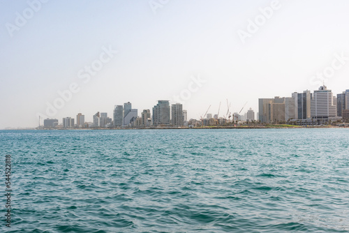 Tel Aviv skyline. A view from the water of the old Yaffa Port. High quality photo © Avi