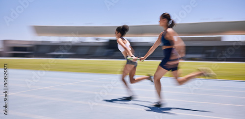 Speed race, relay and woman running in marathon competition, sports event or high energy track sprint. Action, moving and teamwork of fast athlete, runner or women cardio training for France olympics