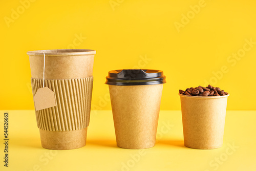 Paper cups with tea bag and...