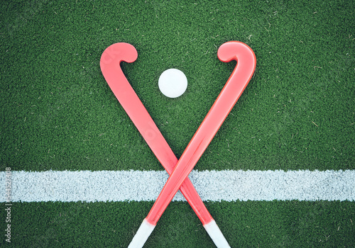 Foto Turf field, hockey stick or sports ball on the ground for fitness competition, exercise contest or practice match