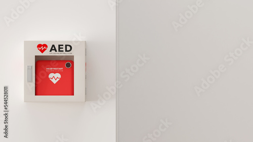 白い壁に取り付けられたAED（救命除細動器）のフォトリアルな3Dレンダリングイラスト