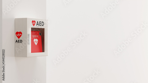 白い壁に取り付けられたAED（救命除細動器）のフォトリアルな3Dレンダリングイラスト