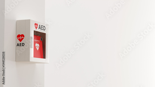 白い壁に取り付けられたAED（救命除細動器）のフォトリアルな3Dレンダリングイラスト photo