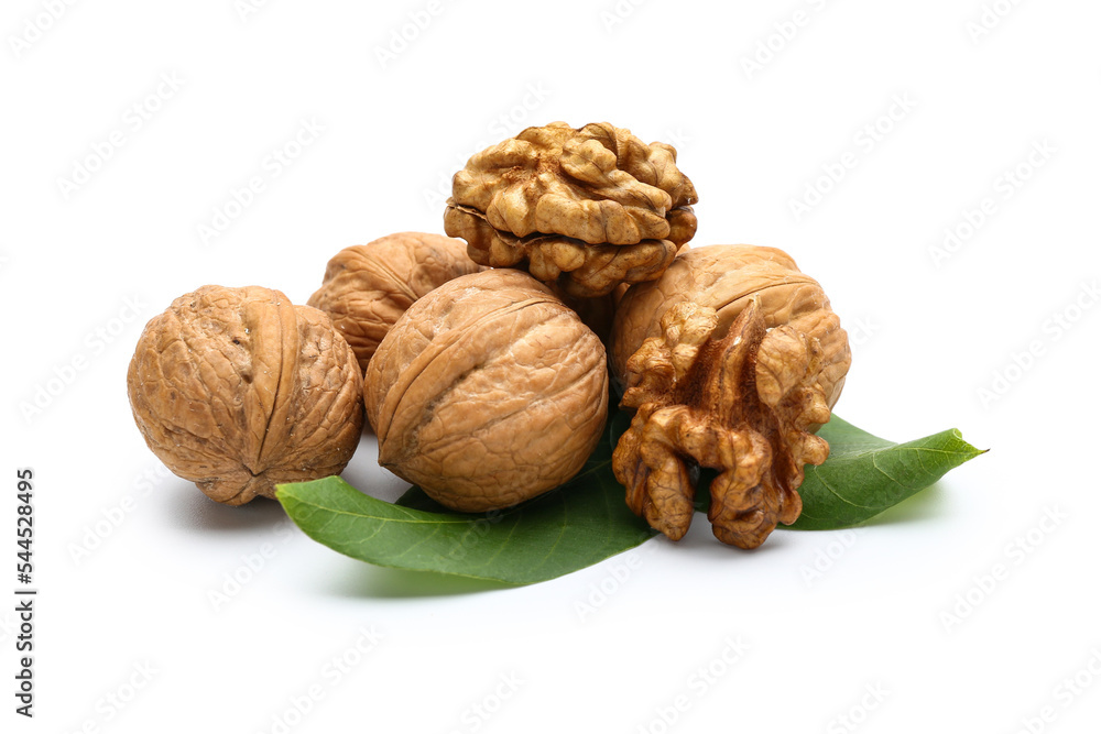 Heap of fresh walnuts on white background Heap of fresh walnuts on white background
