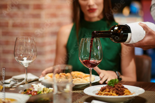 Waiter Filling Wine Glass