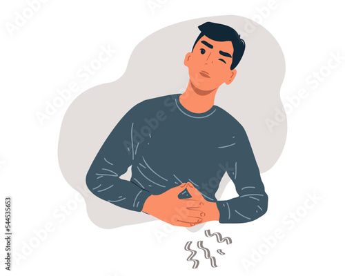 A man holds his stomach with his hands, pain in the stomach, pancreas, intestines or urinary system