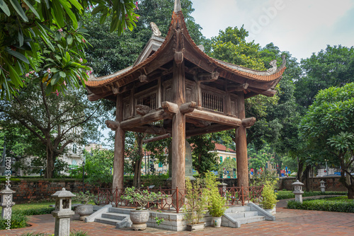 Wood traditional tower pagoda structure and park at the gardens of the Temple Of Literature in Hanoi Vietnam
