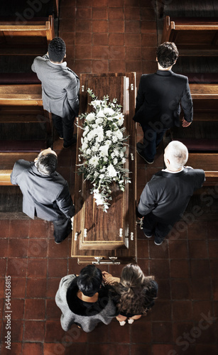Fotografía Funeral, coffin and family mourning death of loved one, death and carrying wood casket in church for faith wake, eulogy and memorial