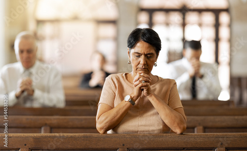 Fotografia Faith, woman and praying in church, religion and spiritual connect, communication or believe