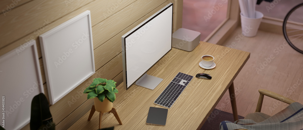 Wooden workspace with PC desktop computer on wooden table against the wood  plank wall Stock Photo | Adobe Stock