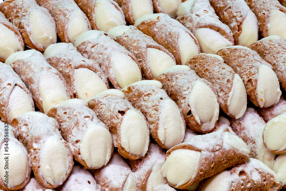 Sicilian cannoli, sweet made with crispy waffle and ricotta, typical Italian pastry
