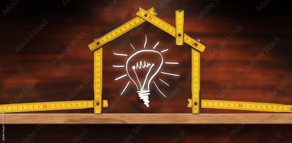 Folding ruler in the shape of a house and a design of a light bulb ...