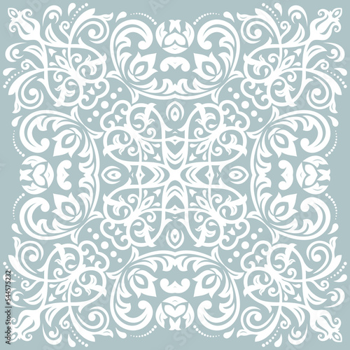 Oriental light blue and white pattern with arabesques and floral elements. Traditional classic ornament. Vintage pattern with arabesques © Fine Art Studio