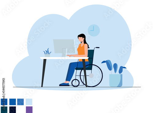 Une femme handicapée qui travaille sur son ordinateur.