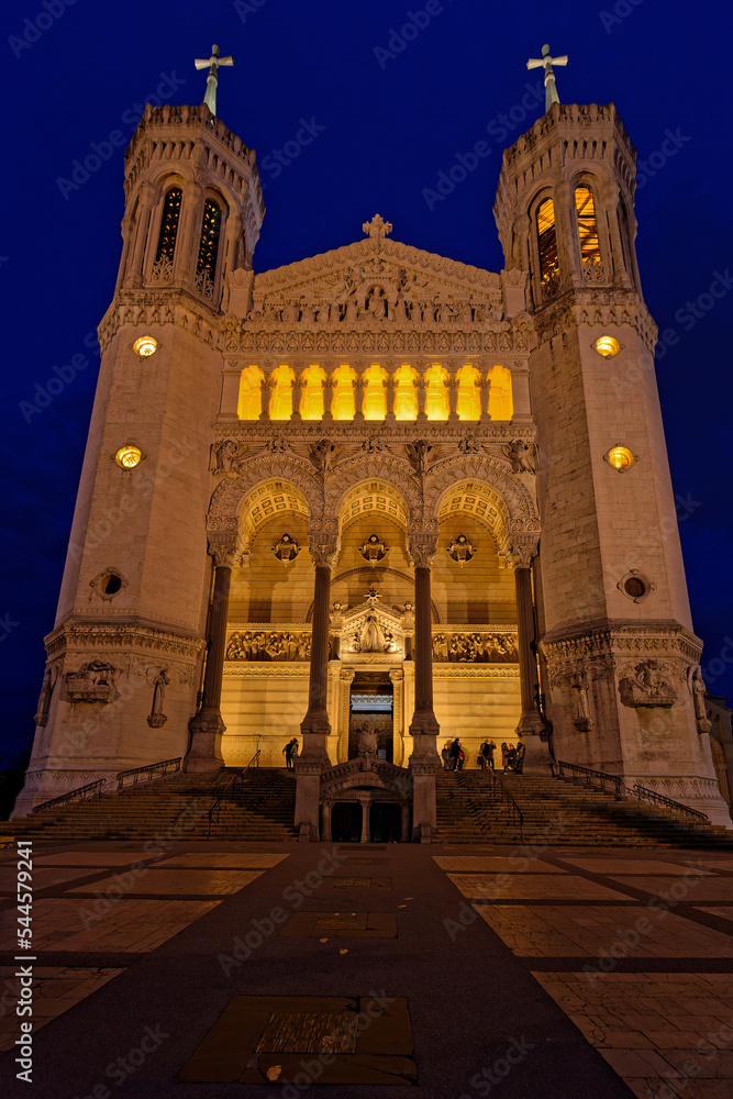 LYON, FRANCE, November 8, 2022 : Main facade of Fourvière Basilica. Lyon commemorates the 150th anniversary of the laying of the foundation stone of basilica.