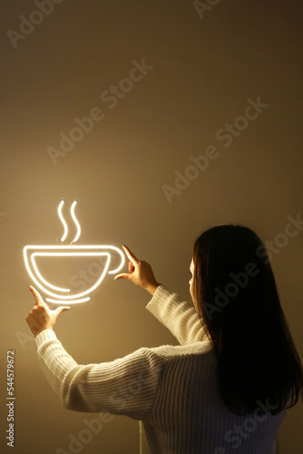 Beautiful girl with neon signs. White neon sign coffee and tea. Trendy style. Neon sign. Custom neon. Home decor. Coffee shop.