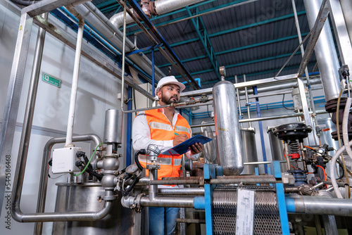 Mechanical engineer inspection pipe tube connection commissioning ready for plant startup machine