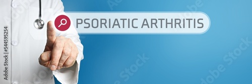Psoriatic arthritis. Doctor in smock points with his finger to a search box. The term is in focus. Symbol for illness, health, medicine photo