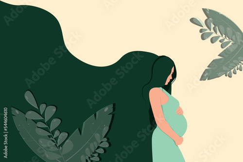A pregnant beautiful woman hugs her pregnant belly against a background of  plants and flowers.Modern banner about pregnancy and motherhood.