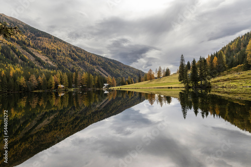 Obraz na płótnie Lake Etrachsee in the Austrian municipality of Krakau in the Murau district of Styria. It is 1,374 meters above sea level in the Krakau Valley, a high plateau in the Schladminger Tauern, Austria w salonie
