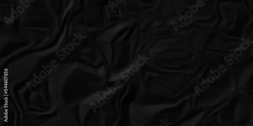 Dark Black facbric paper crumpled texture. dark black textured crumpled black paper background. panorama black paper texture background  crumpled pattern  