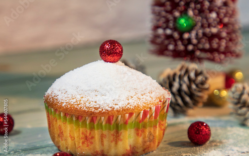 Christmas muffin with red decoration, holiday concept